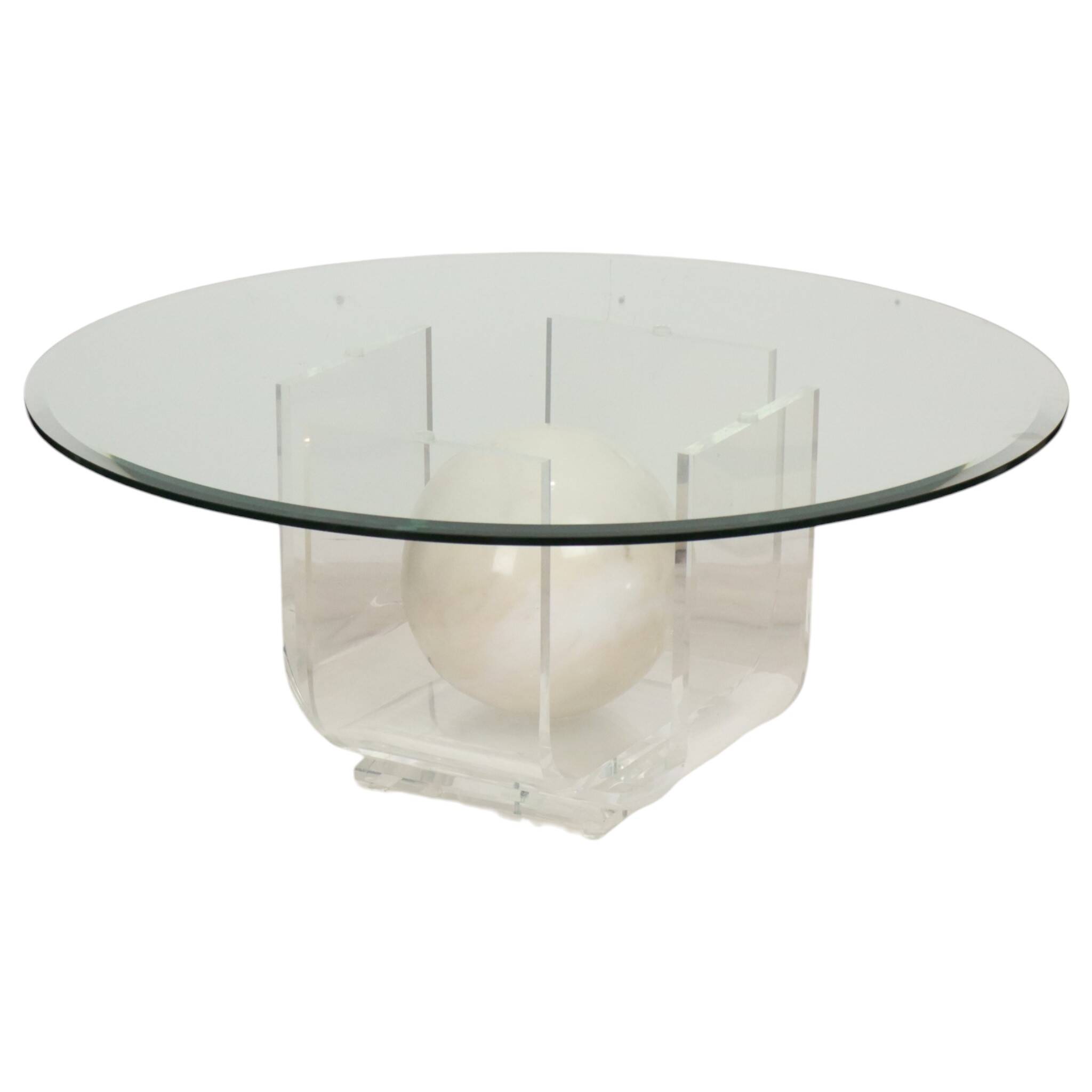 Vintage round coffee table in lucite and marbled glass.