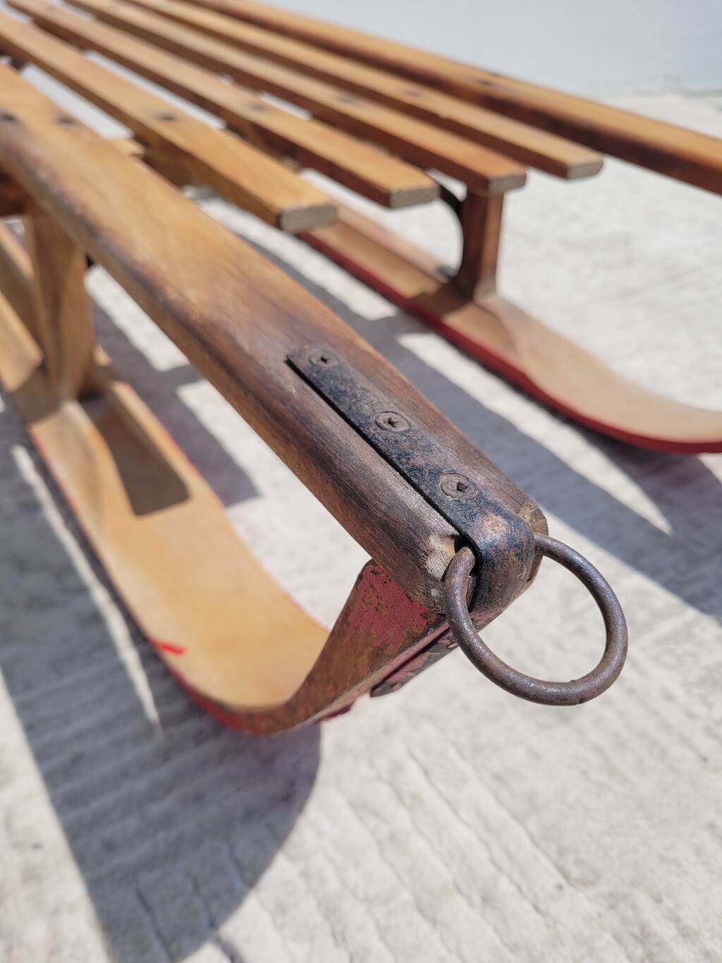 Antique wooden sled with metal runners