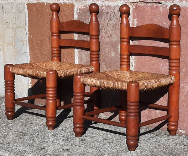 Paire de fauteuils bas de cheminée. (Assise paille)