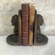 Antique bookends, Bust figure in bronze patinated plaster. 19 x 13 cm