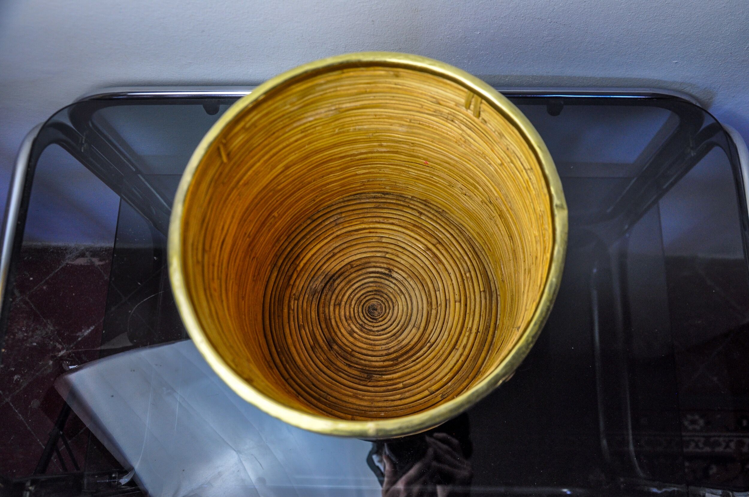 Rattan and brass book basket, Italy, 1970, 25 diam