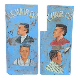 Ancienne enseigne peinte de coiffeur africain en bois