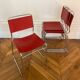Set of 4 chairs in red leather and chrome tubular metal