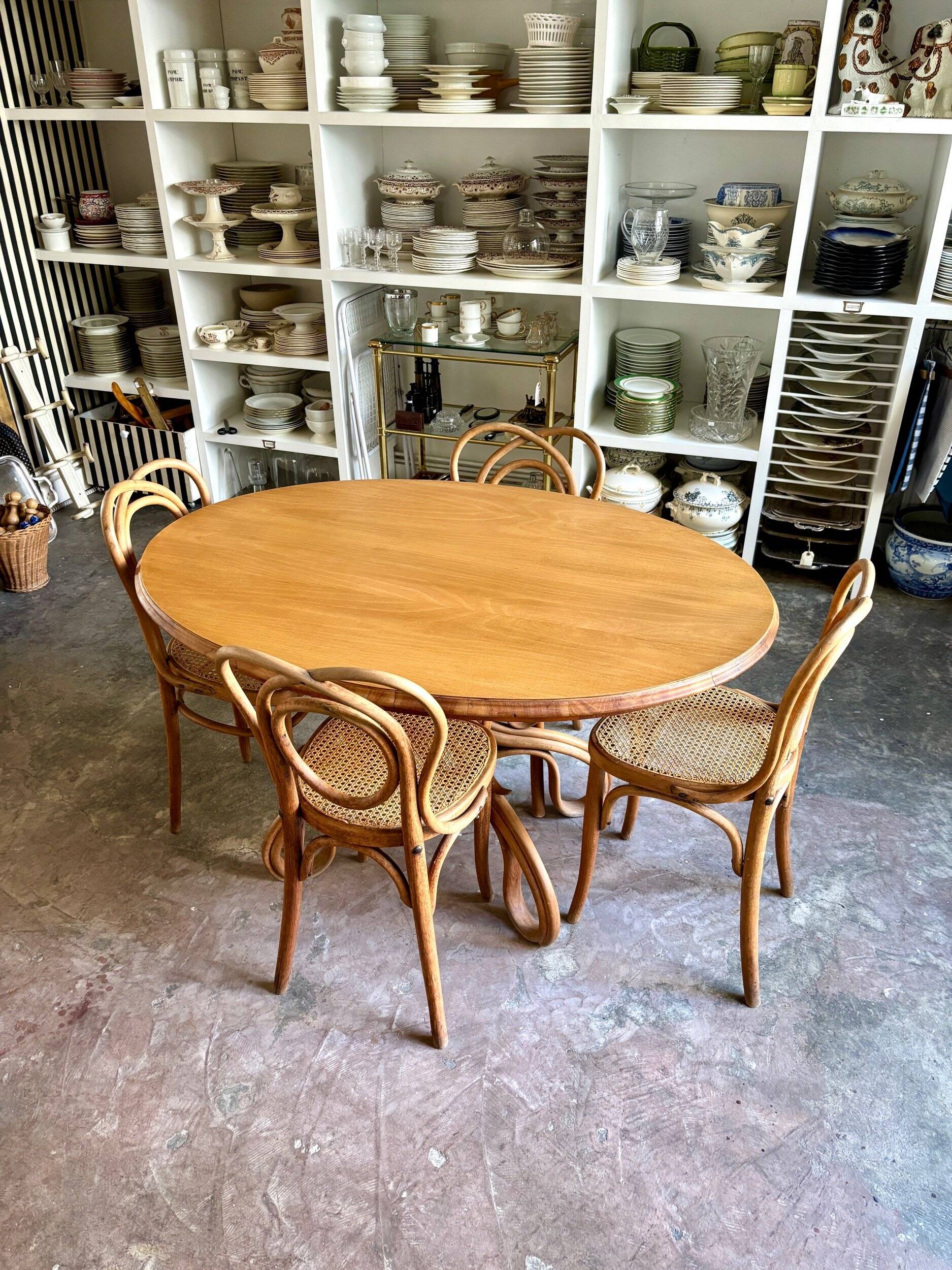 Thonet table no. 3 and 4 bent beech chairs with caning, circa 1890.