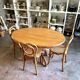 Thonet table no. 3 and 4 bent beech chairs with caning, circa 1890.