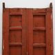 Large 17th century Monastery doors in terracotta lacquered oak, Portugal