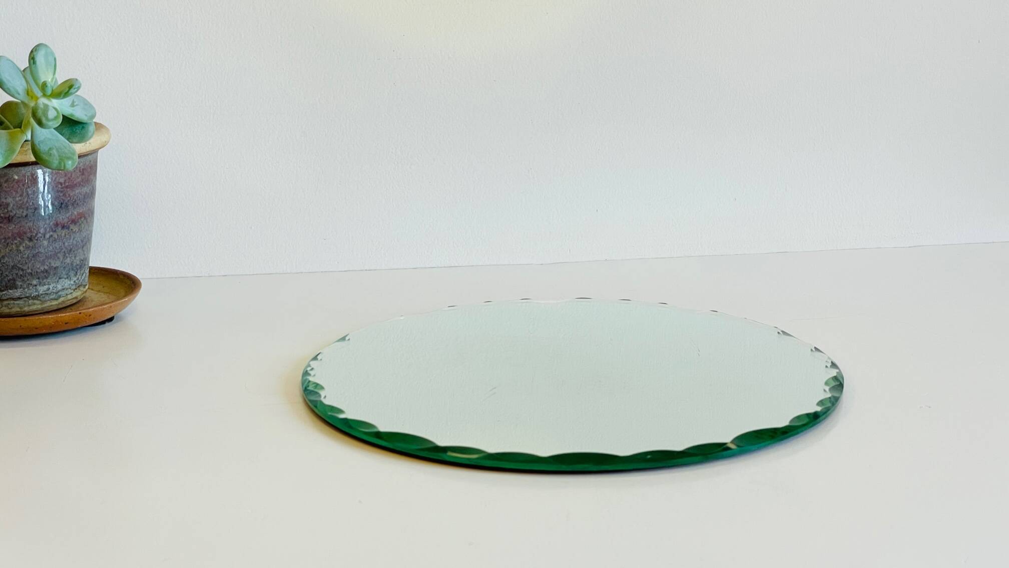 Vintage round and beveled table mirror