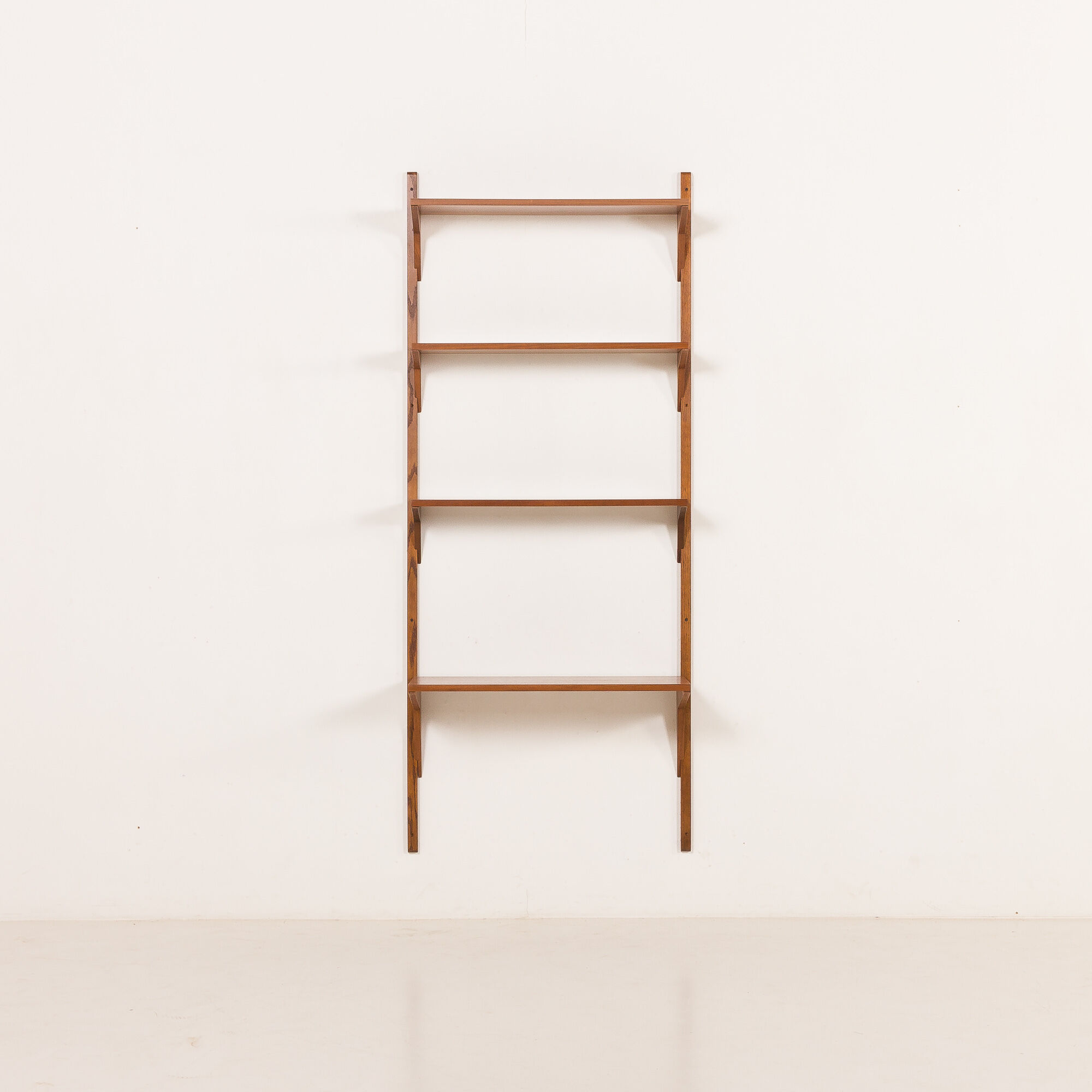 Danish mid-century walnut shelving unit in the style of Poul Cadovius, 1960s