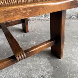 Brutalist dark brown solid wood armchair with natural rattan seat and cognac leather back