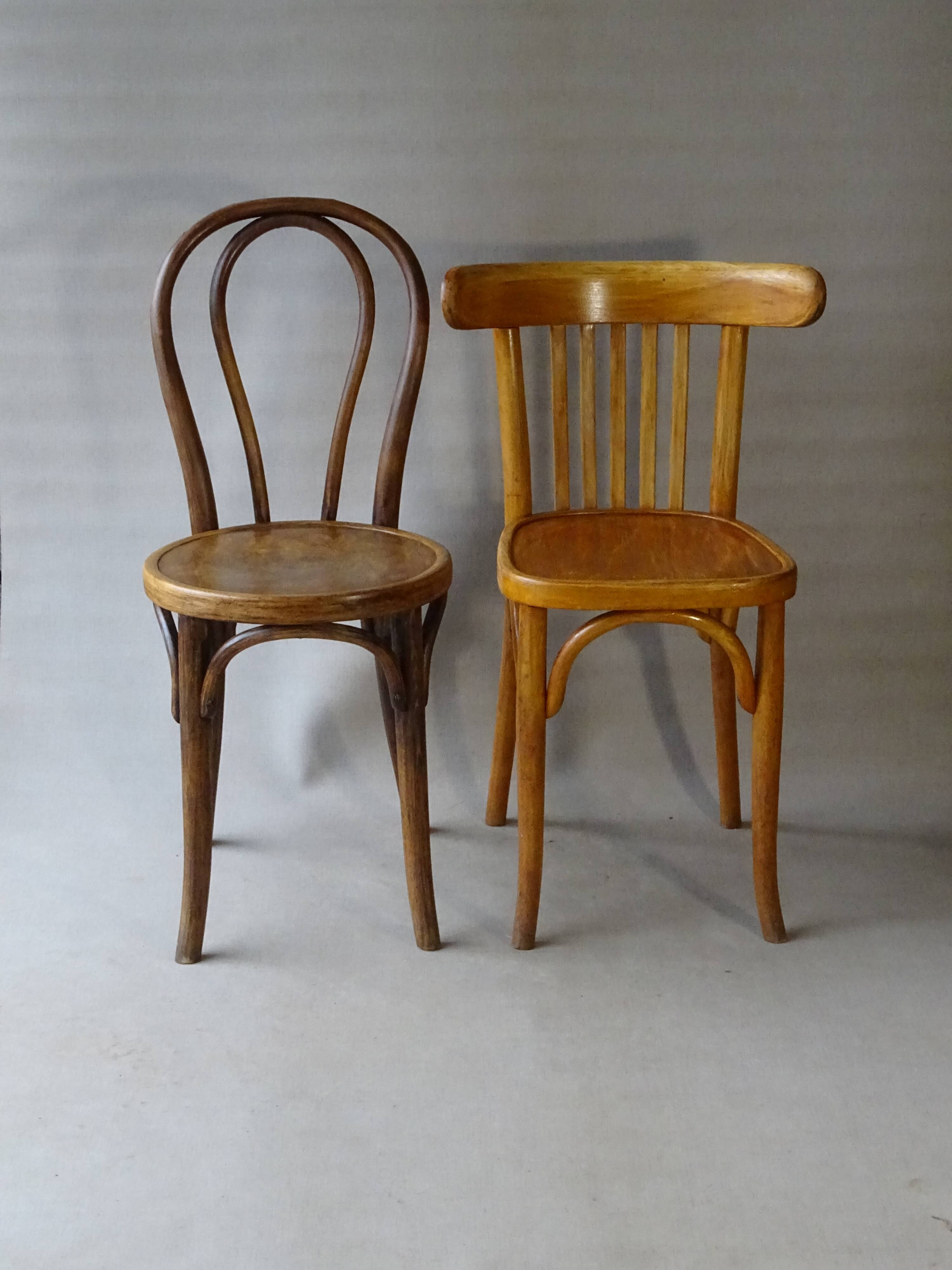 Set of 36 mismatched Bistrot chairs, 1920 to 1950, wooden seats.