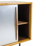 Low ash sideboard with sliding doors. 1960s.