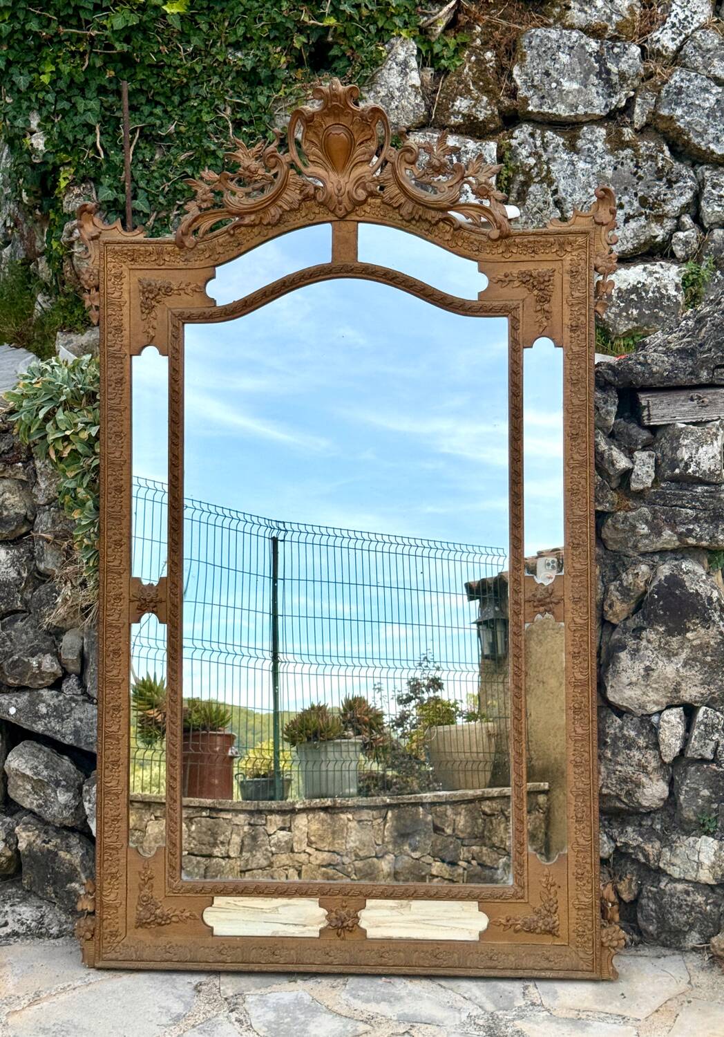 Mirror in gilded wood and stucco, with glazing beads, Napoleon III period.