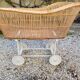 Wicker cradle on wheels, late 19th century