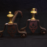 Pair of andirons in gilded bronze and iron of the 19th