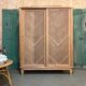 Vintage sliding wardrobe in raw oak
