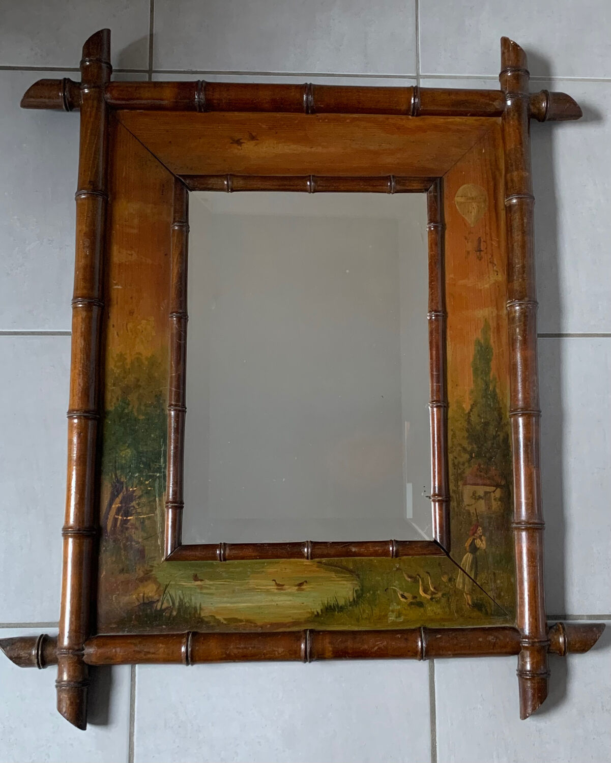 Bamboo wood mirror and 19th-century paintings