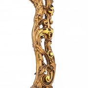 A large mirror in a gold frame, Italy, first half of the 20th century.