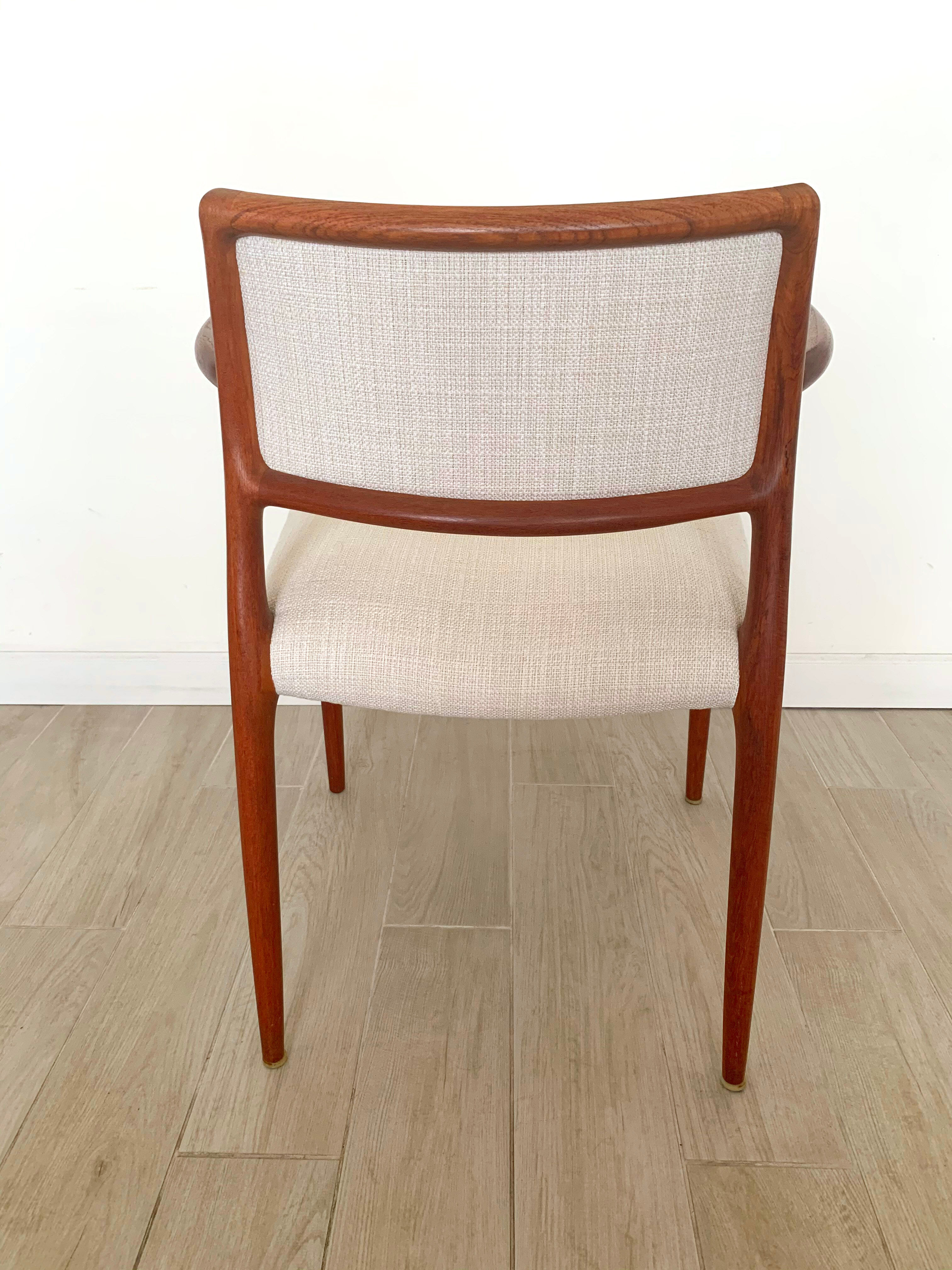 Armchairs model 65 mid century in teak by N.O.Moller for J.L.Mollers