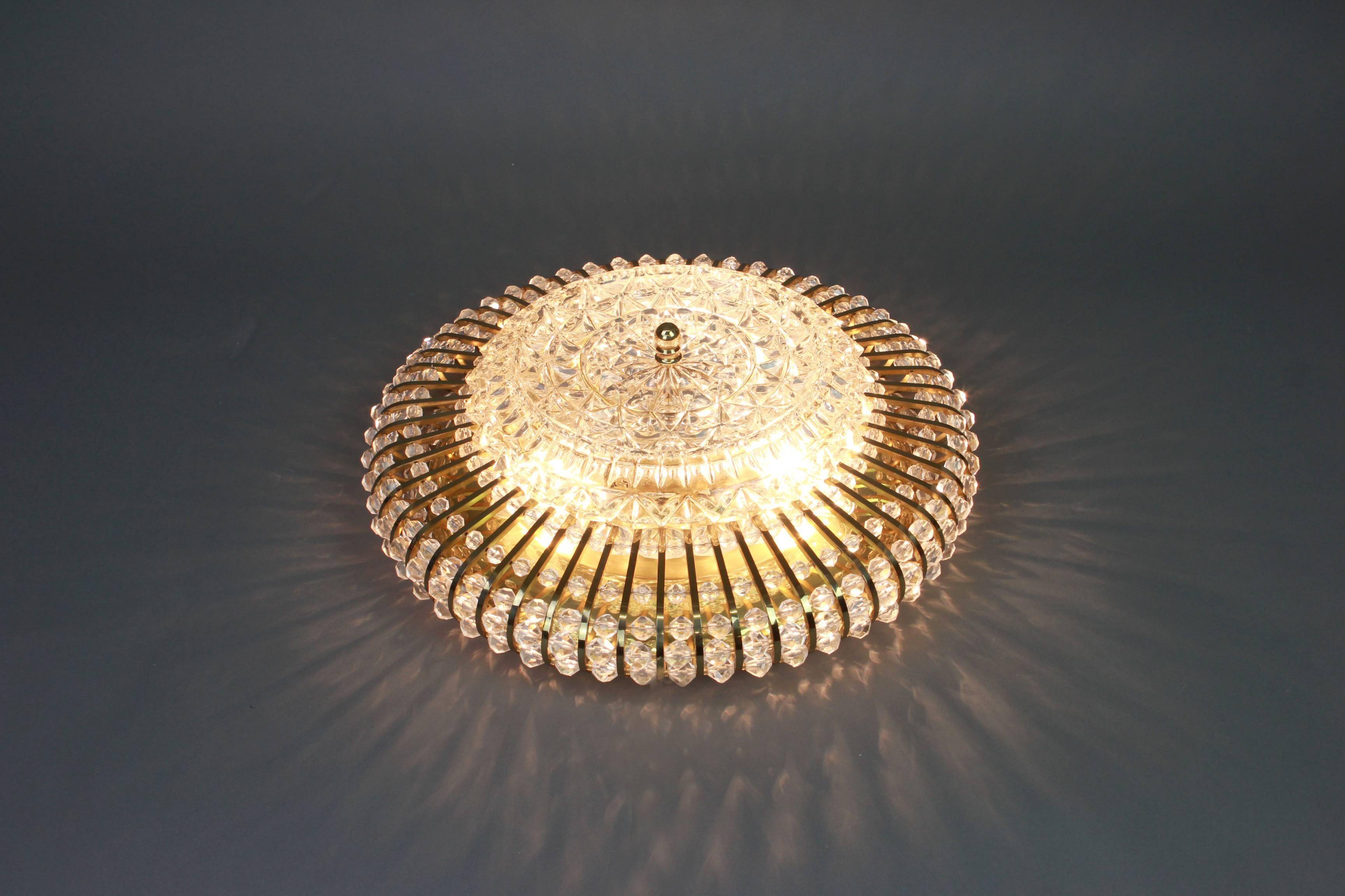 Hillebrand wall sconce in brass, glass, and Lucite beads, Germany, 1960s.