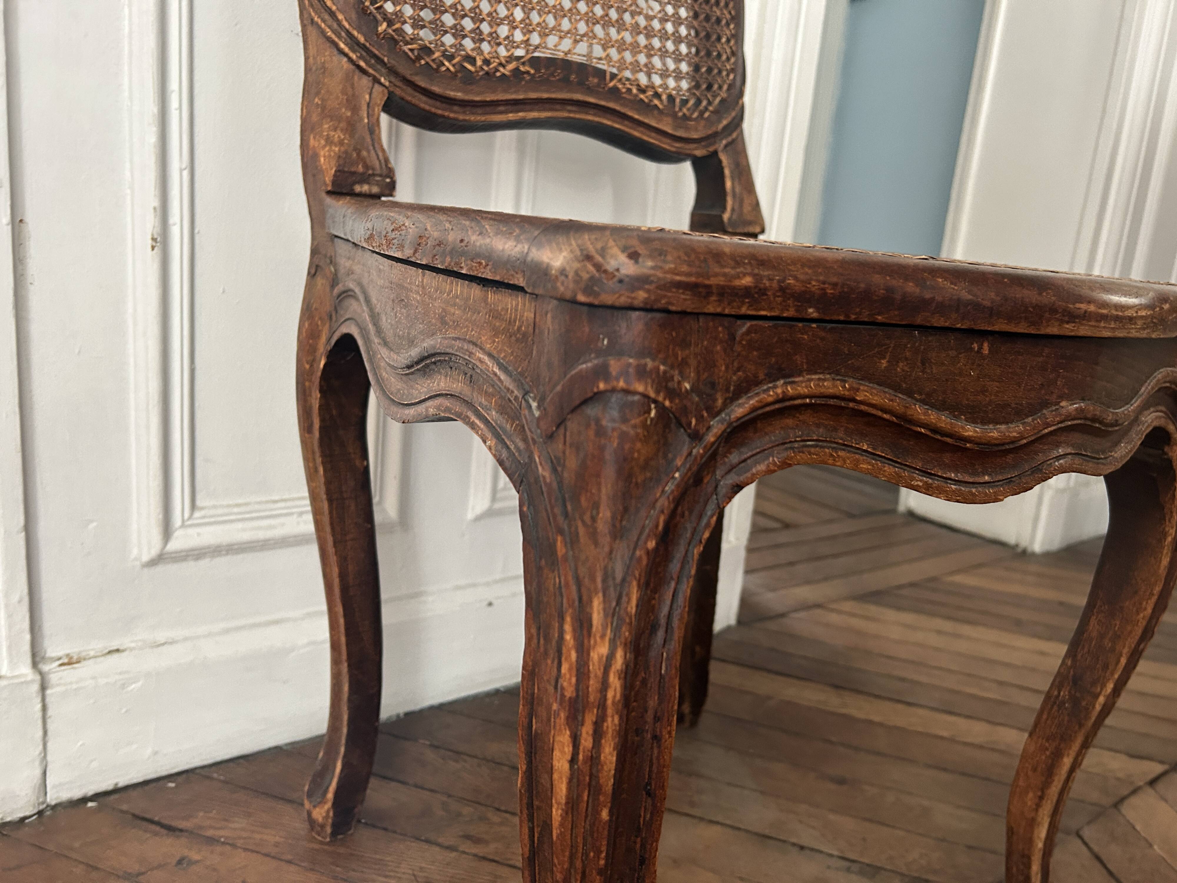 Antique Louis XV chair – molded natural wood / cane base