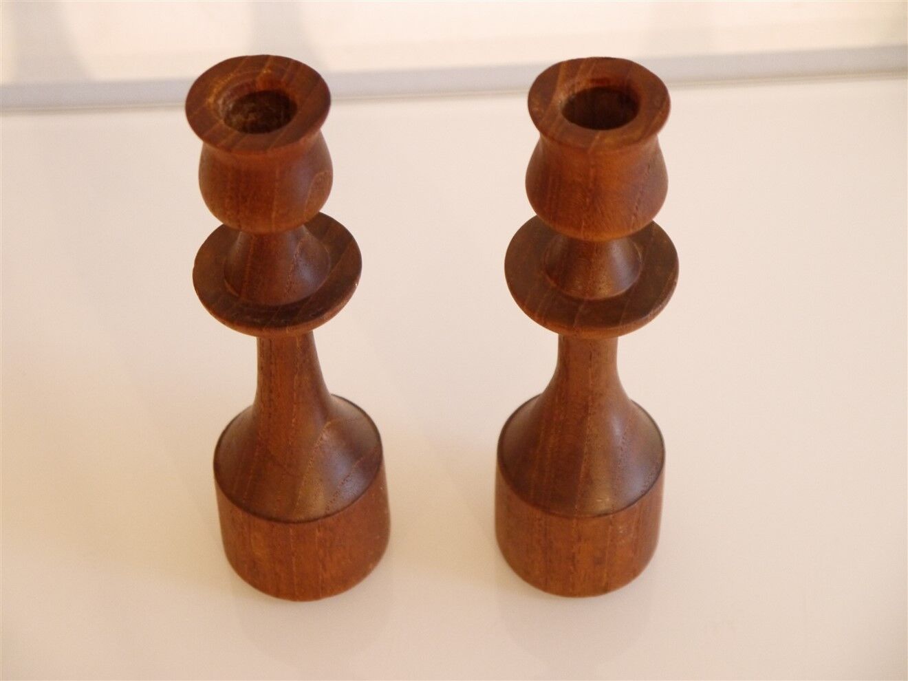 Pair of Scandinavian candle holders in teak 1960