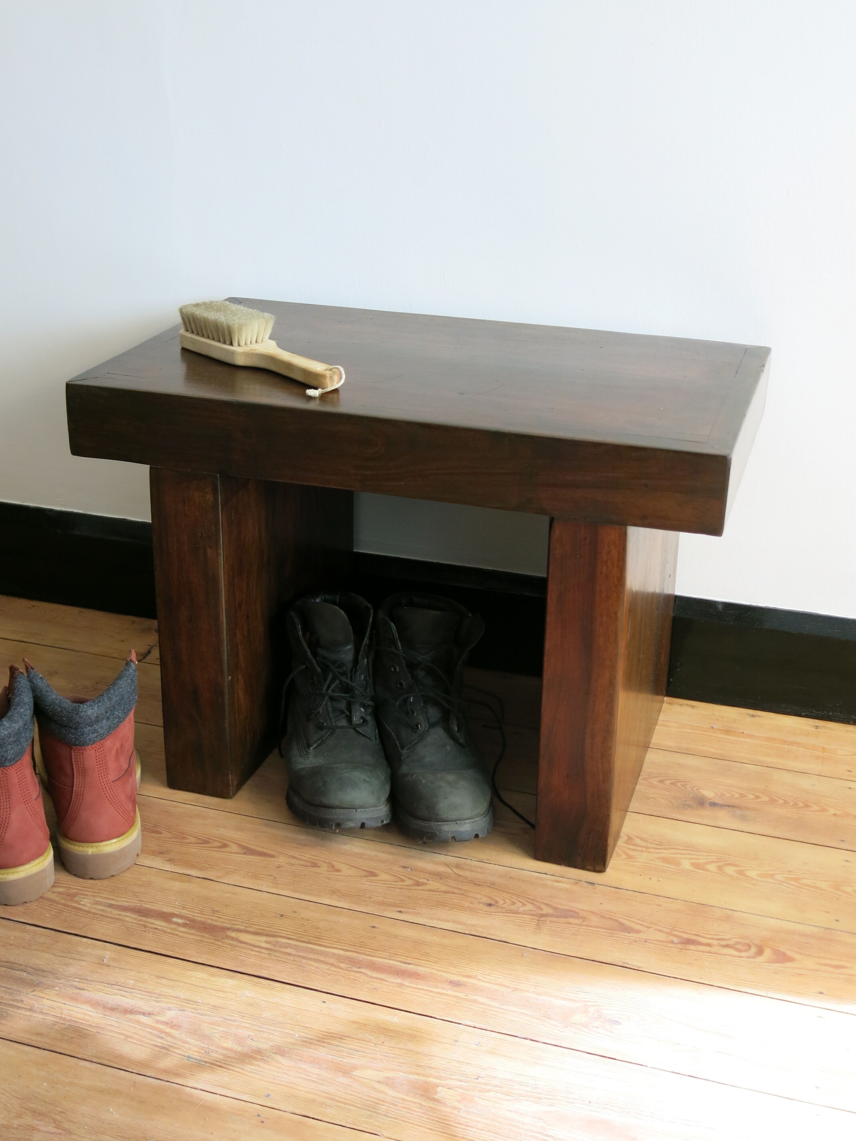 Solid bench made of tropical wood
