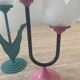 Duo of vintage metal and glass candlesticks