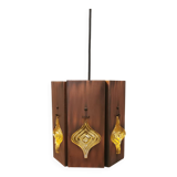Older hanging lamp, made of metal with yellow prisms.