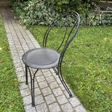 Black chair in vintage wrought iron 1980