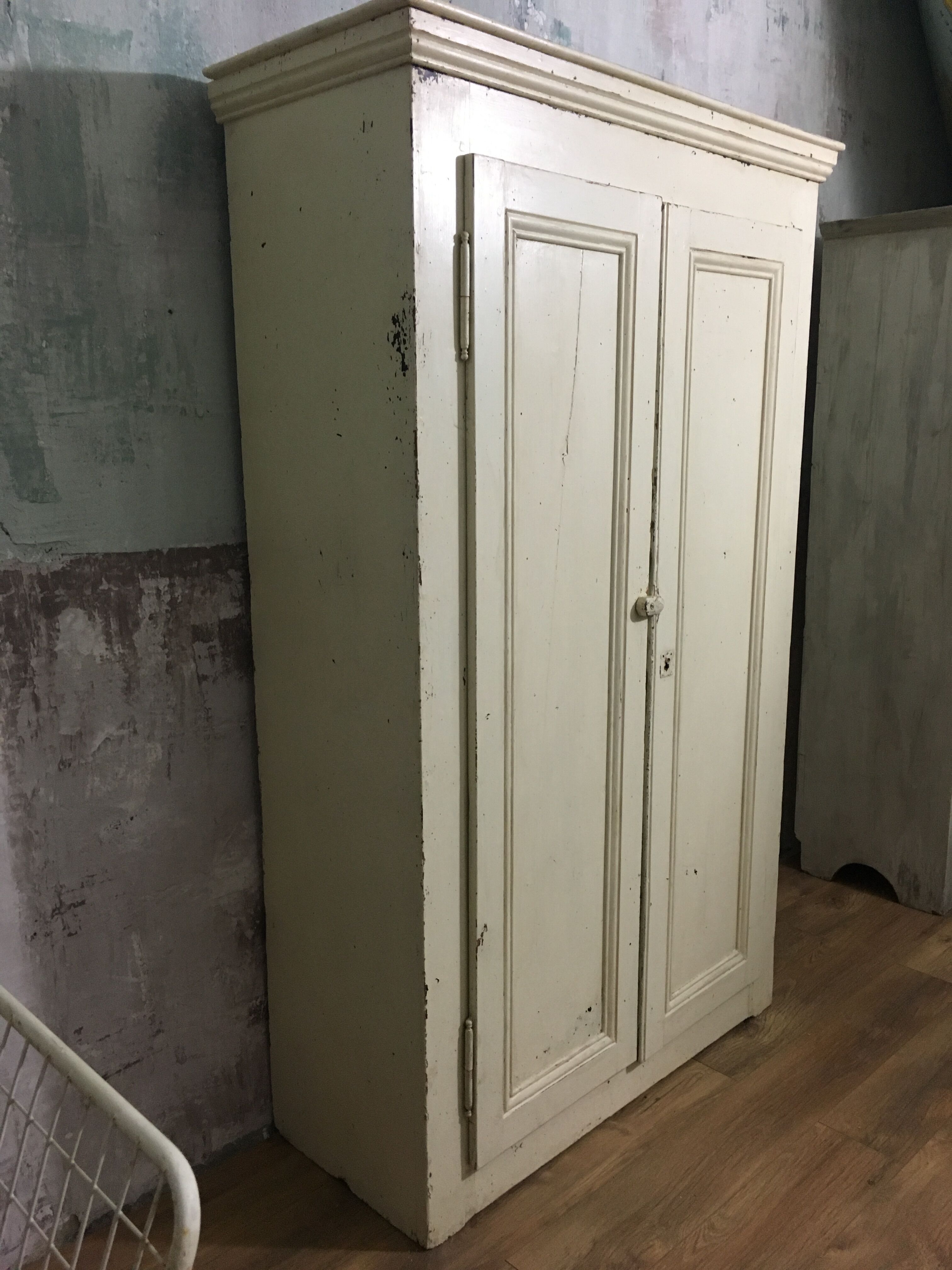 Old wardrobe, aged white patina