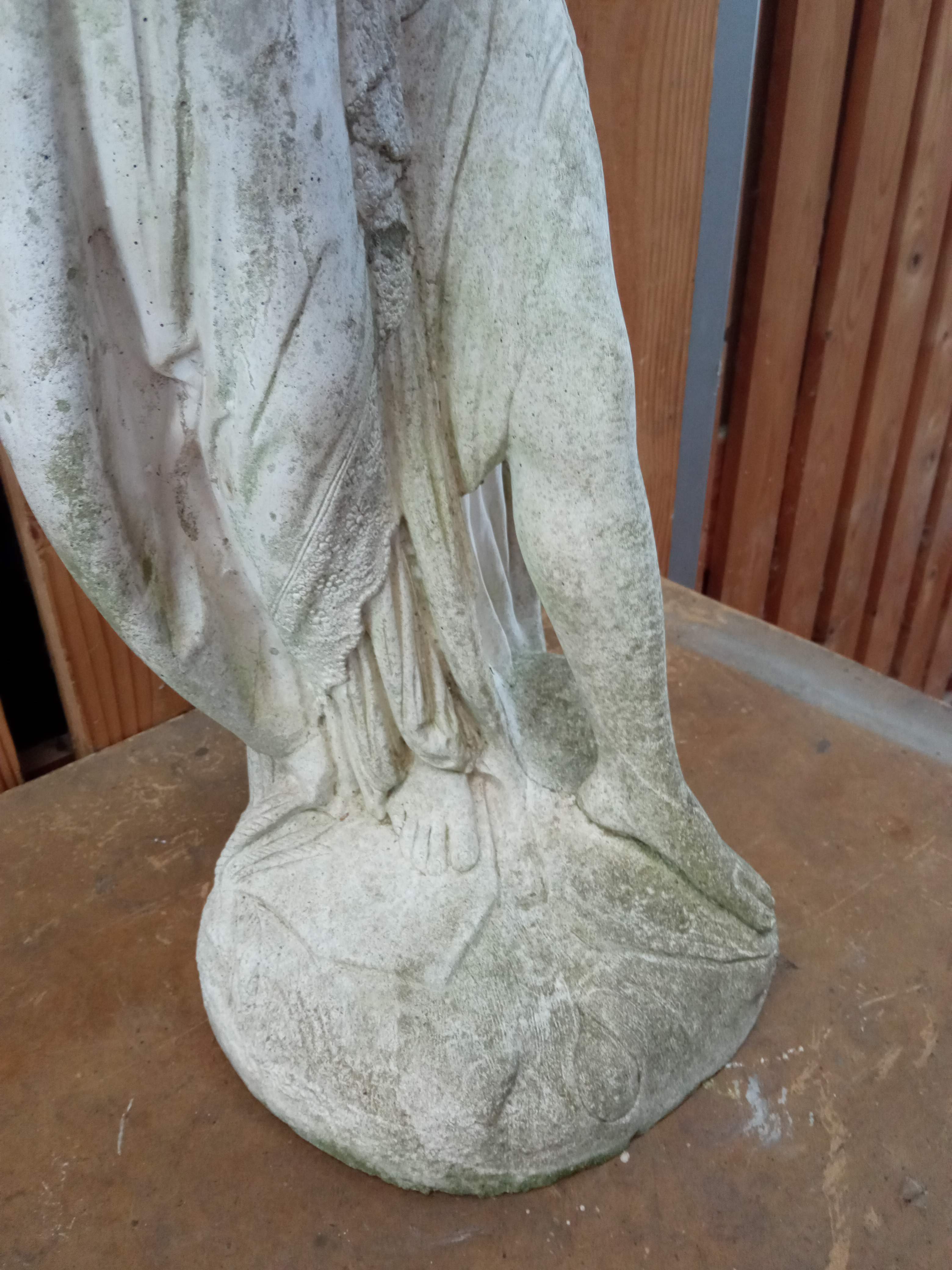 Reconstructed stone garden statue