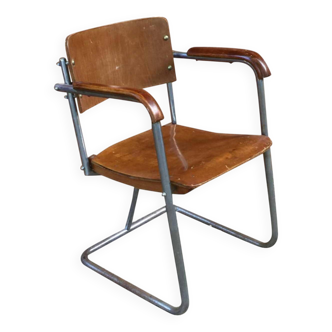 Modernist armchair in plywood, screwed steel tubes