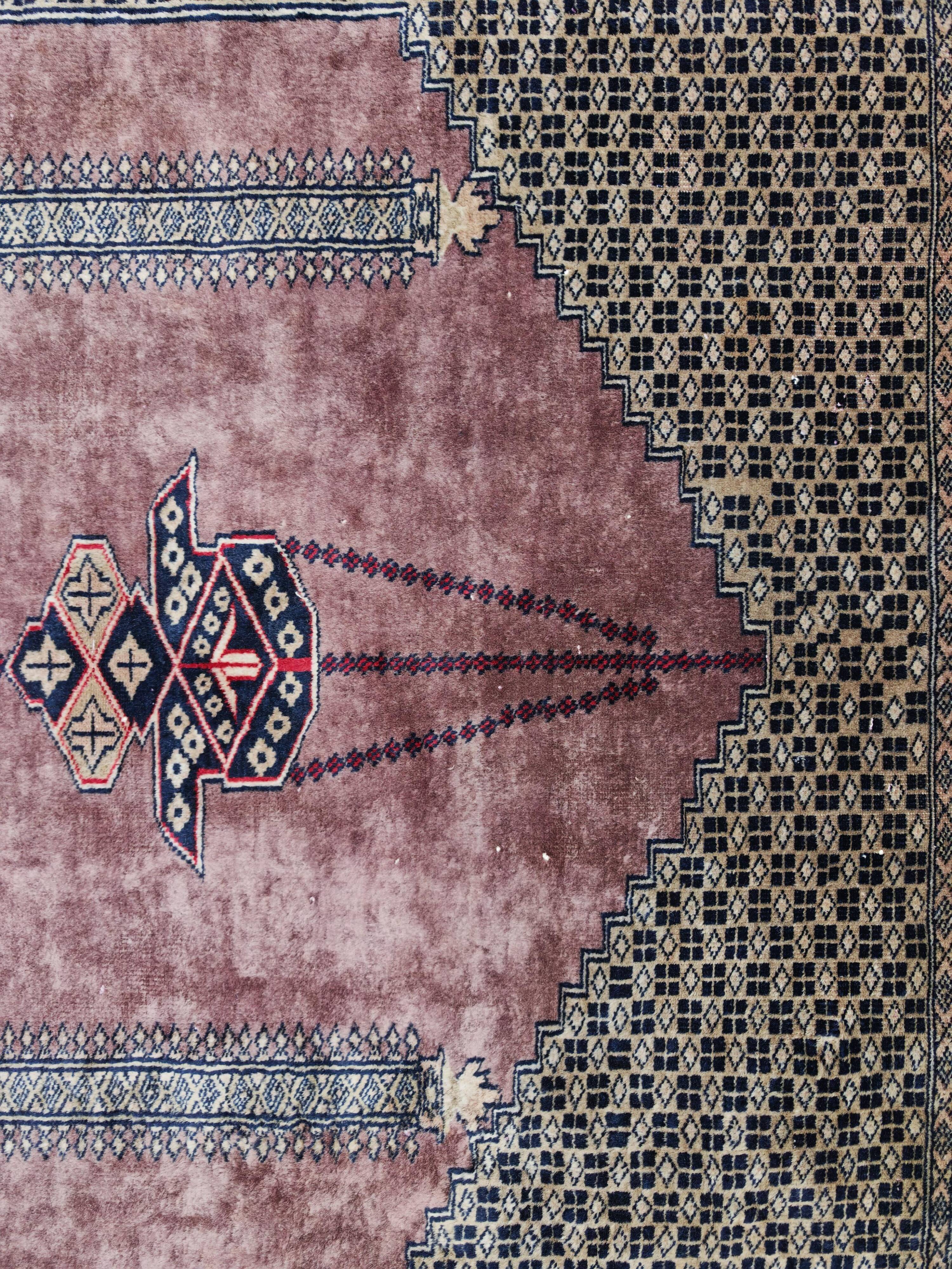 Vintage Anatolian prayer rug made of hand-knotted wool.
