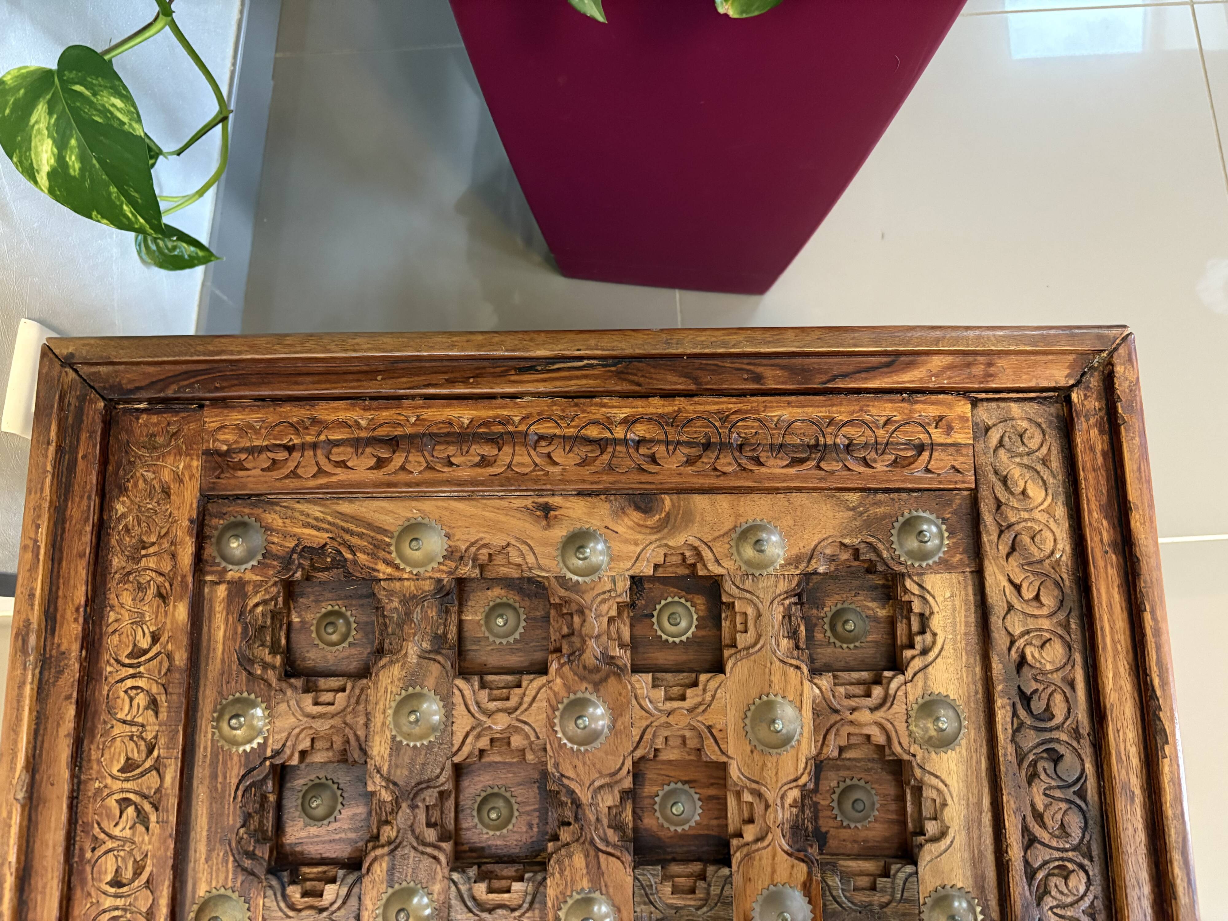 Solid oak carved coffee table with glass top
