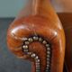 Eared armchair in patinated sheepskin