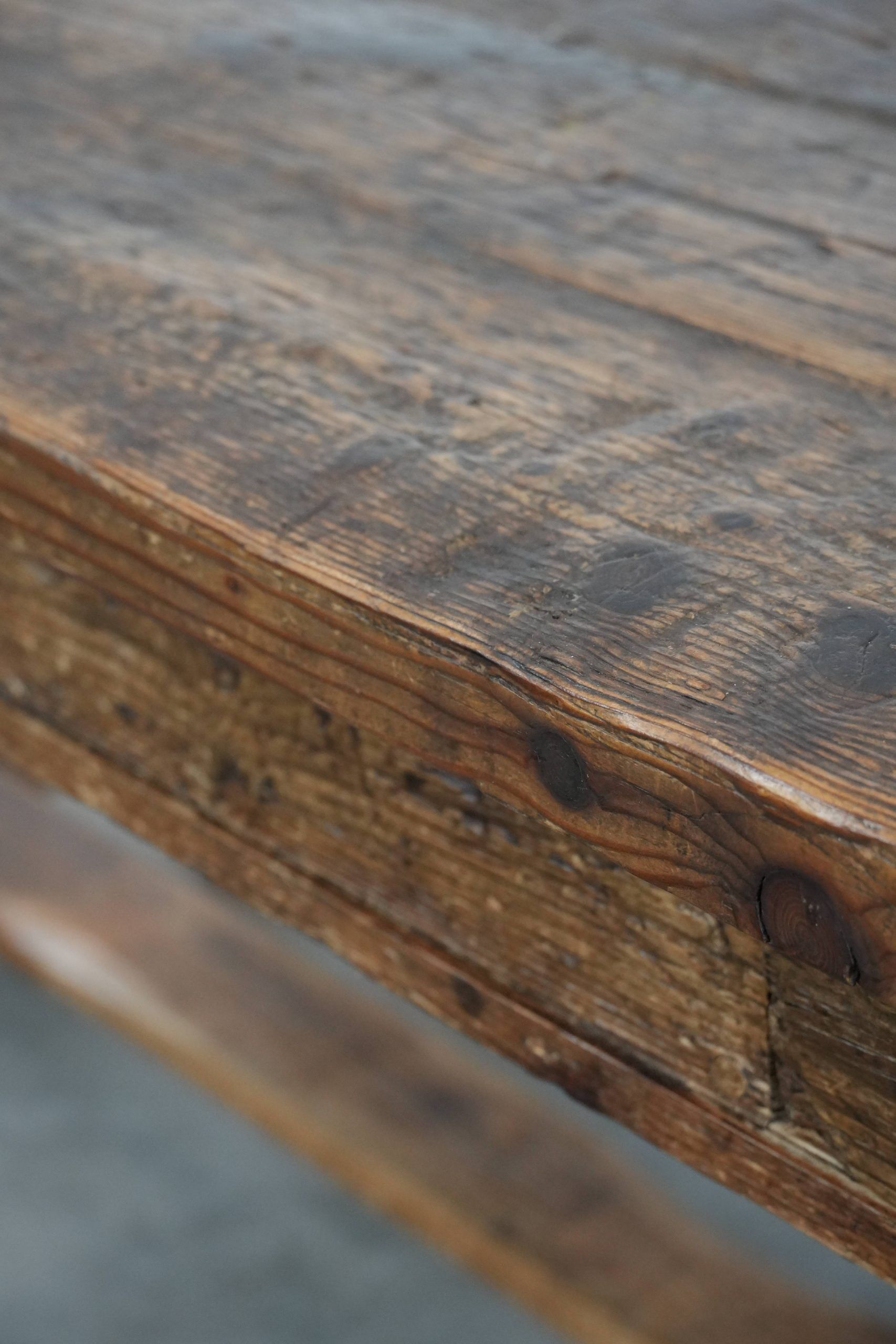 Magnificent and robust antique farmhouse dining table made of pine wood