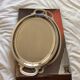 Oval top with stainless steel handles