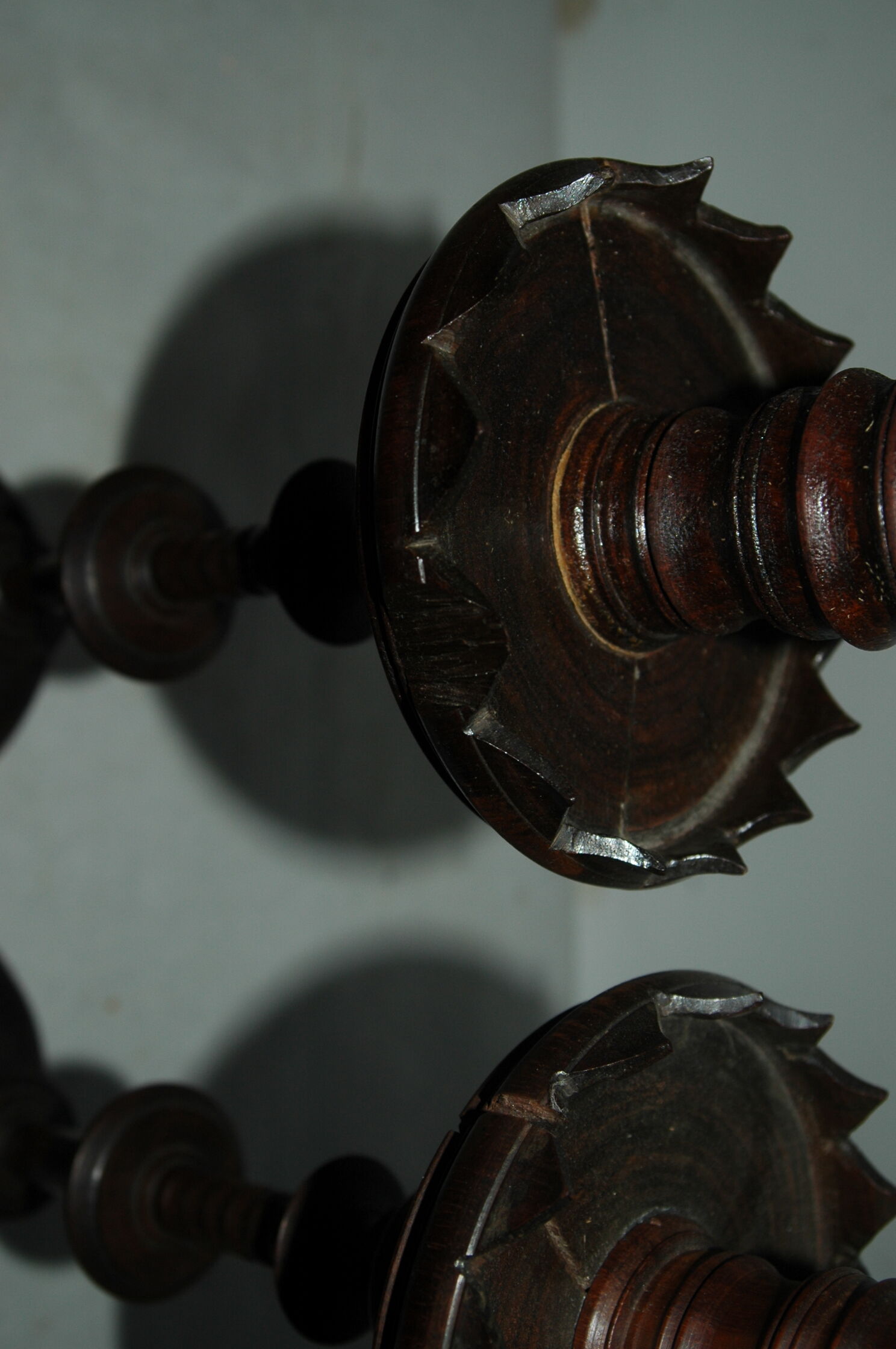 Pair of mahogany turned wood candlesticks