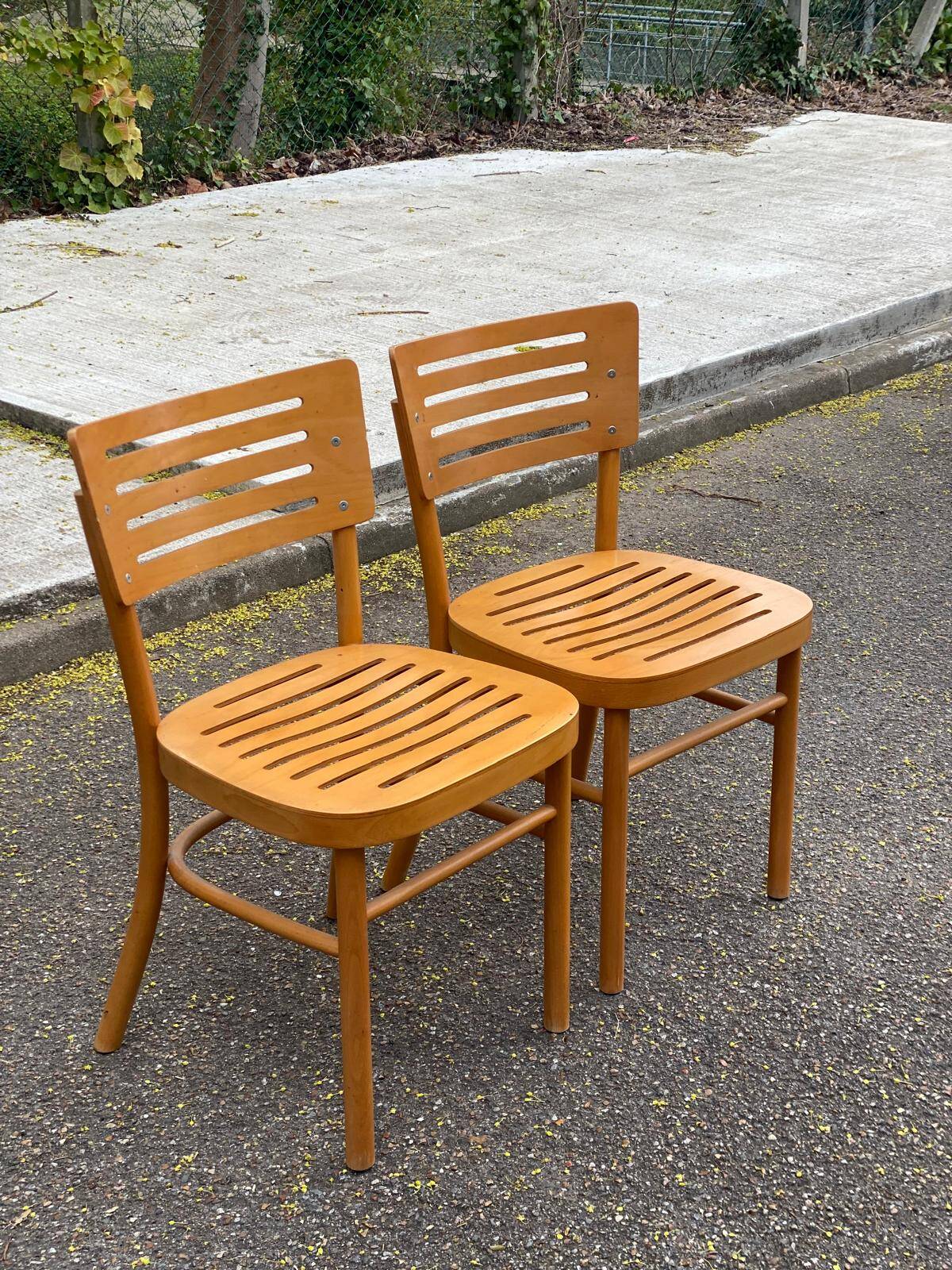 2 Scandinavian bistro chairs from Ikea, Balser, made of curved solid wood, 1999.