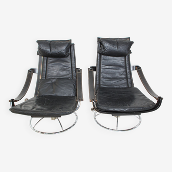 Pair of Black leather swivel seats by Ake Fribytter  1970s