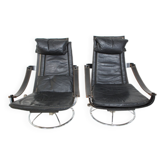 Pair of Black leather swivel seats by Ake Fribytter  1970s