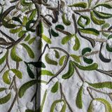 Hand-embroidered tablecloth on rectangular thread canvas