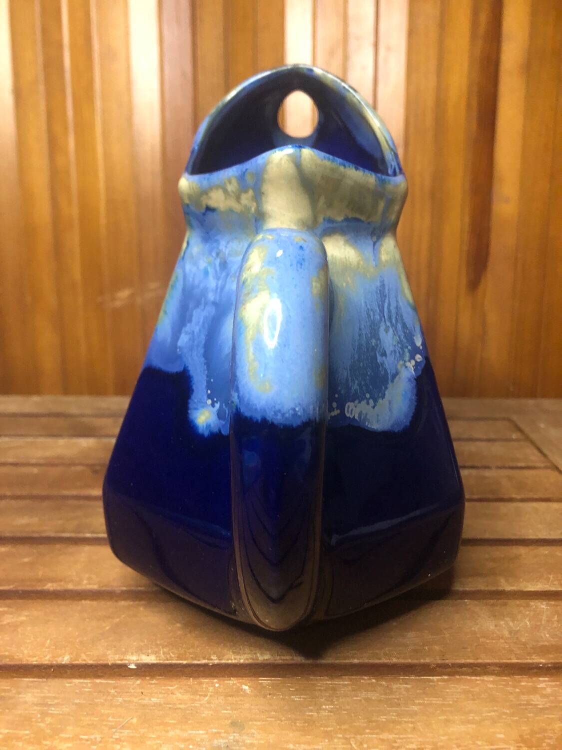Old vintage blue ceramic pitcher