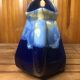 Old vintage blue ceramic pitcher