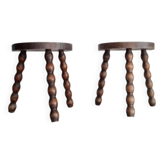 Pair of old wooden tripod stools