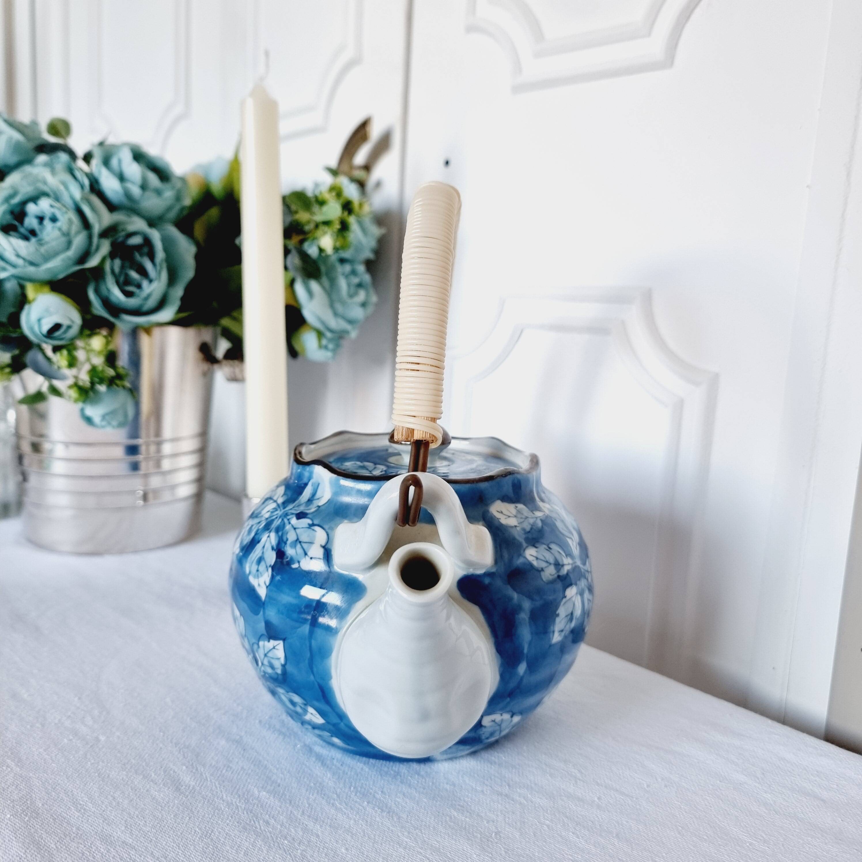 Handcrafted Japanese porcelain teapot hand painted in blue and white.