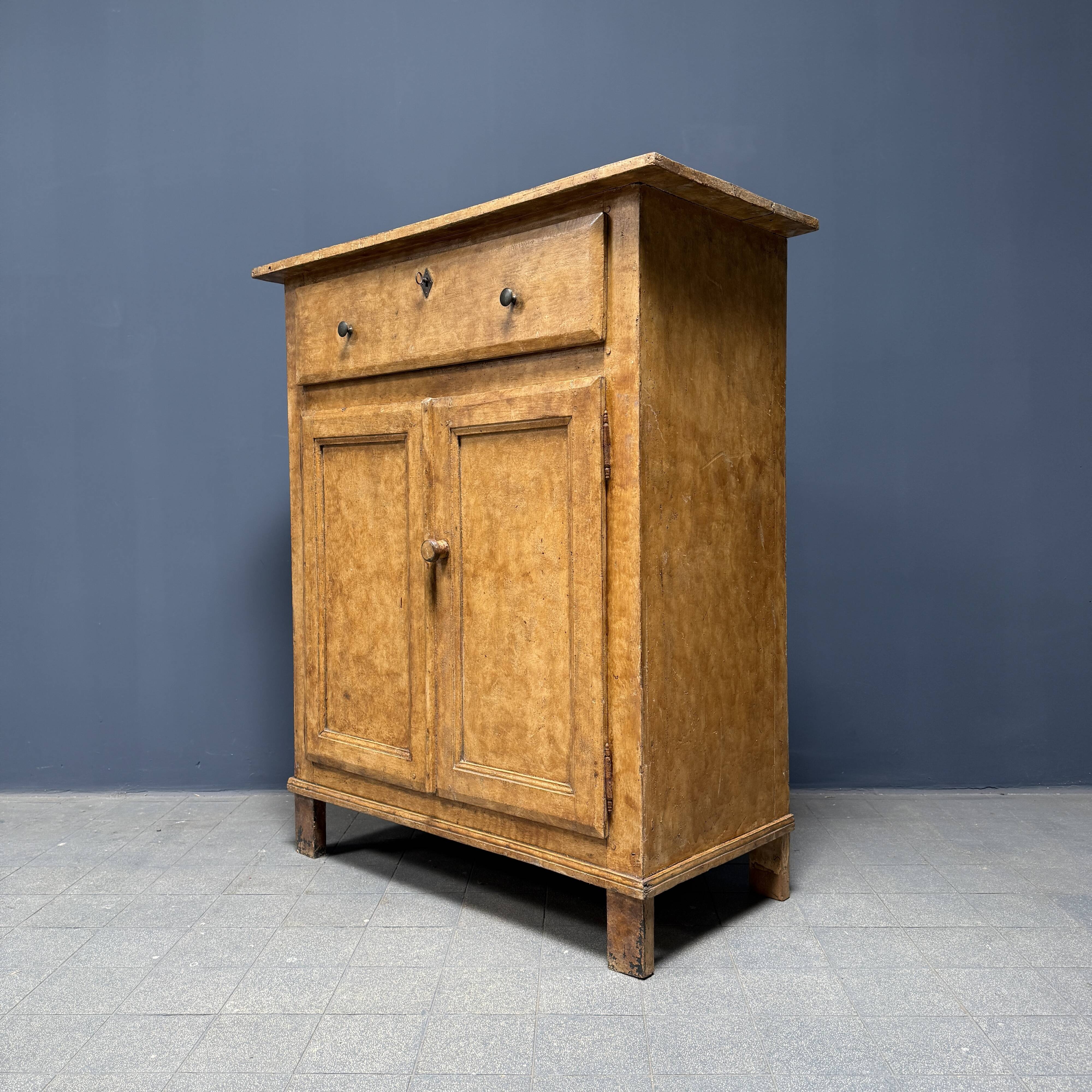 Old marbled ochre yellow French farmhouse cabinet
