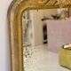 Antique Louis-Philippe mirror carved and gilded with leaf