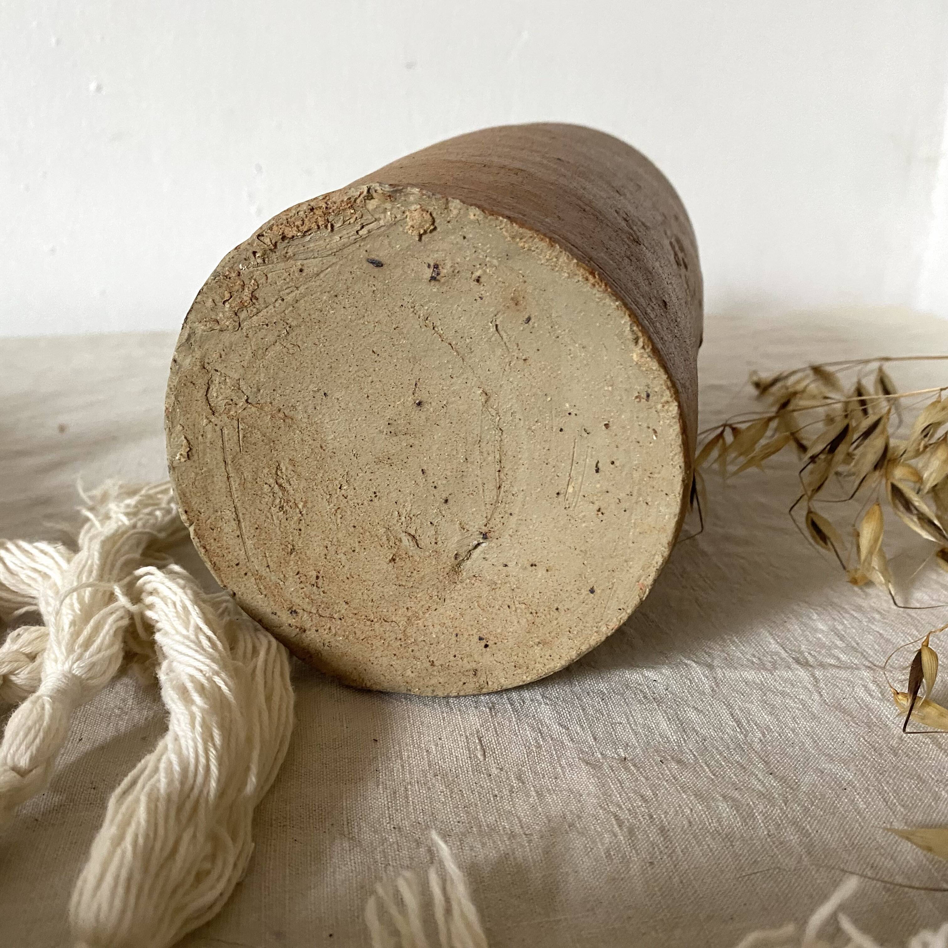 Old terracotta bottle