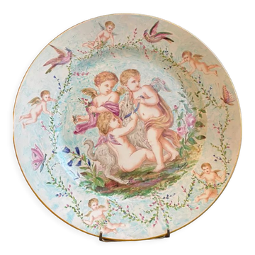Plat rond en faïence- décor main signé et marqué